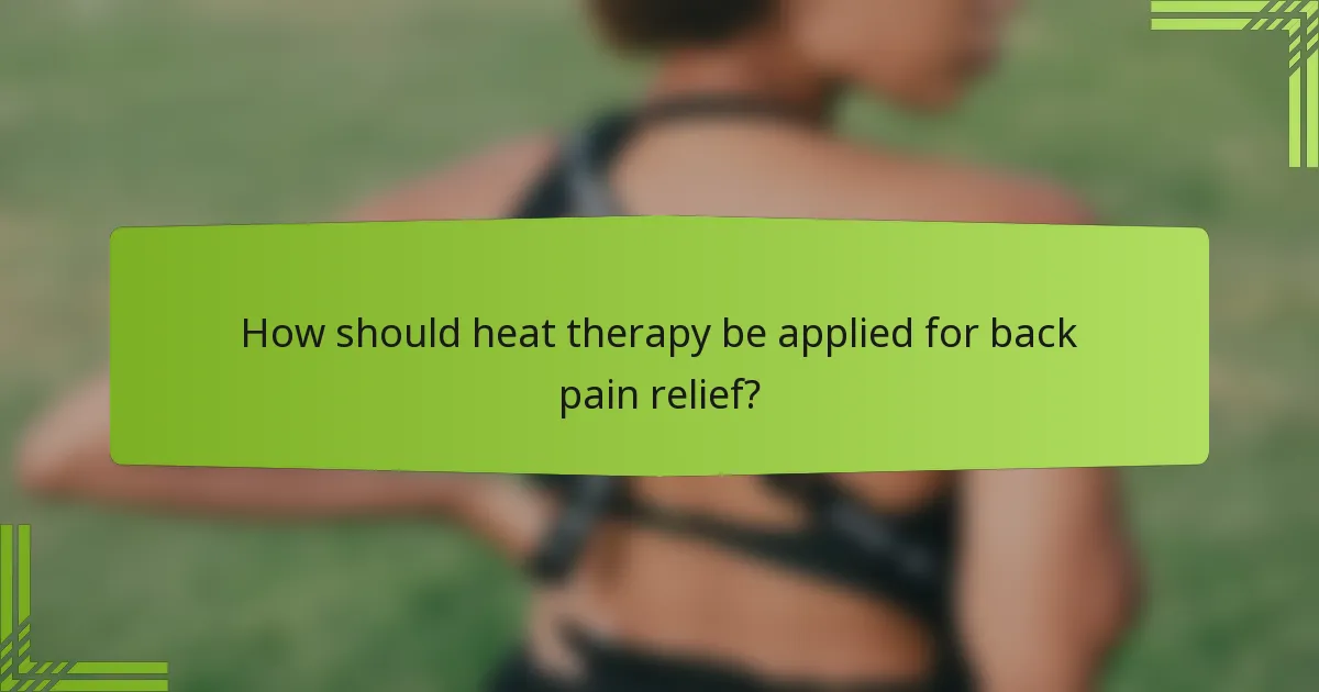 How should heat therapy be applied for back pain relief?